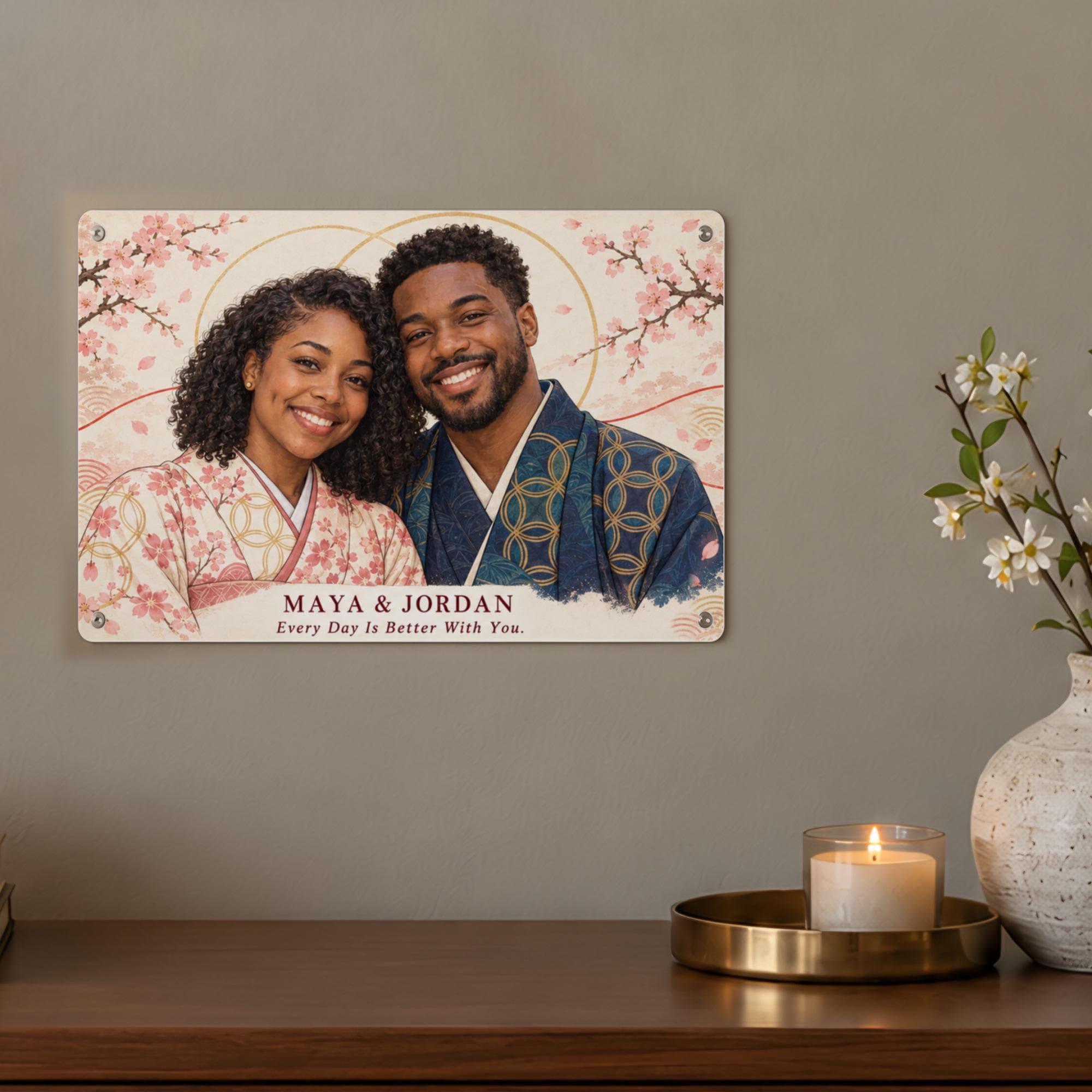 Custom couple portrait from photo on a metal sign above a wooden dresser: an illustrated kimono portrait of a smiling couple with cherry blossoms and the names Maya & Jordan, a personalized anniversary gift.